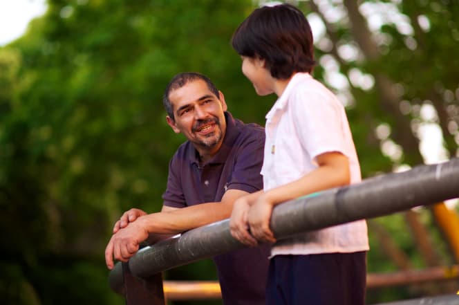 Father and son talking