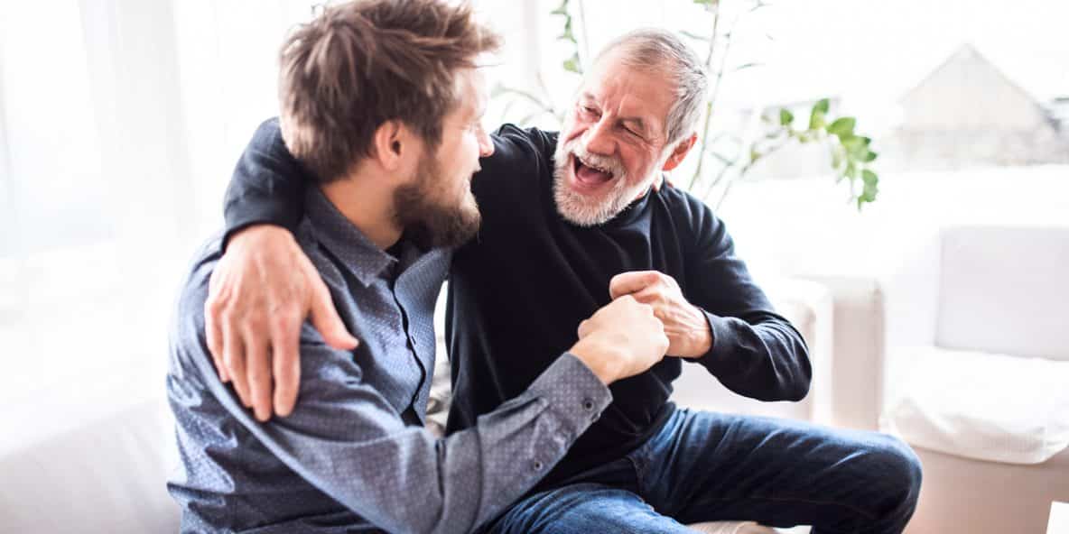 Father and young man talking
